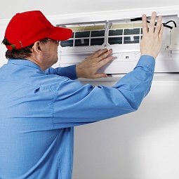 Man Repairing Air Conditioner Indoor 000078379021 Double, 1st Response Heating &amp; Air Solutions