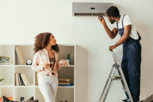 Rsz African American Repairman Fixing Air Conditioner 2023 11 27 05 12 19 Utc, 1st Response Heating &amp; Air Solutions